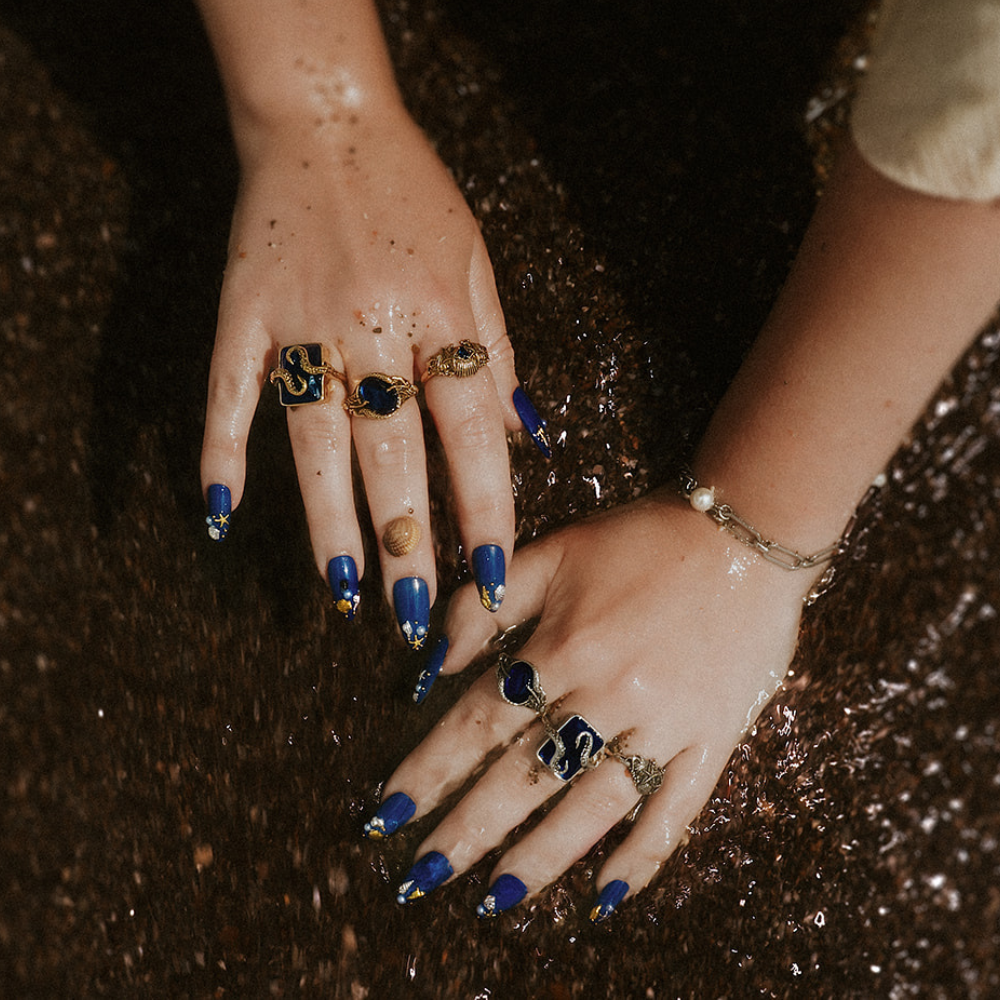 The Siren’s Secret Blue Stone Gold Ring