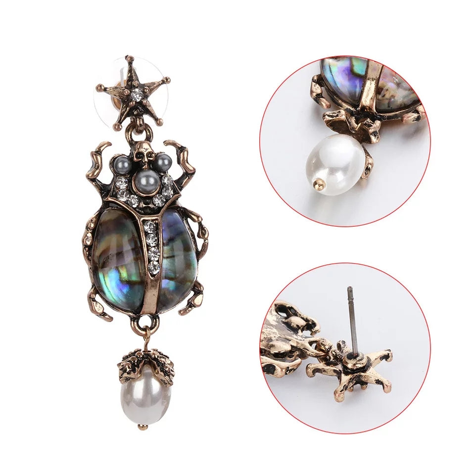 Beetle earrings with hot sale dangling pearls