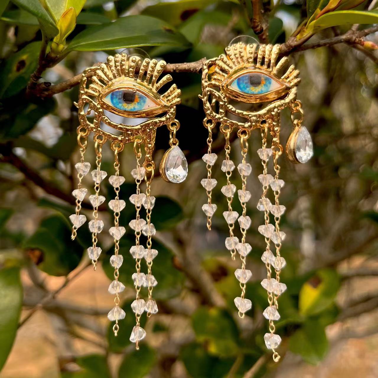 Golden Eye Tassel Earrings