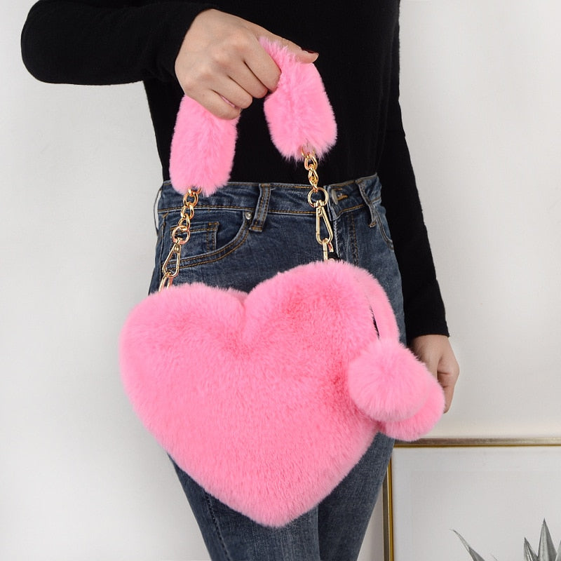 Pink fur purse on sale