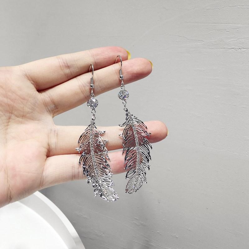 Feather hot sale dangle earrings